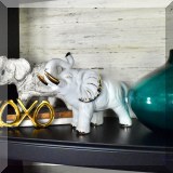D20. Porcelain elephants. 
